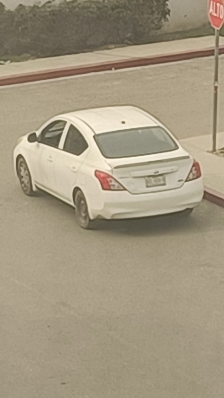 Processed image with license plate annotations