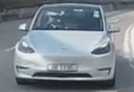 Processed image with license plate annotations