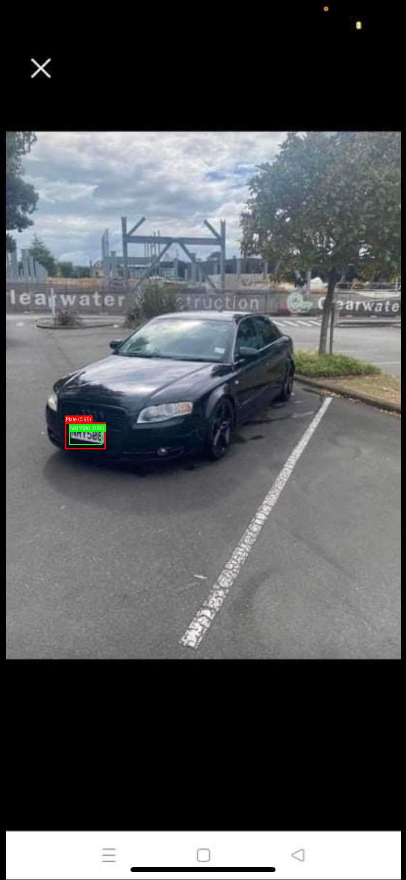 Processed image with license plate annotations
