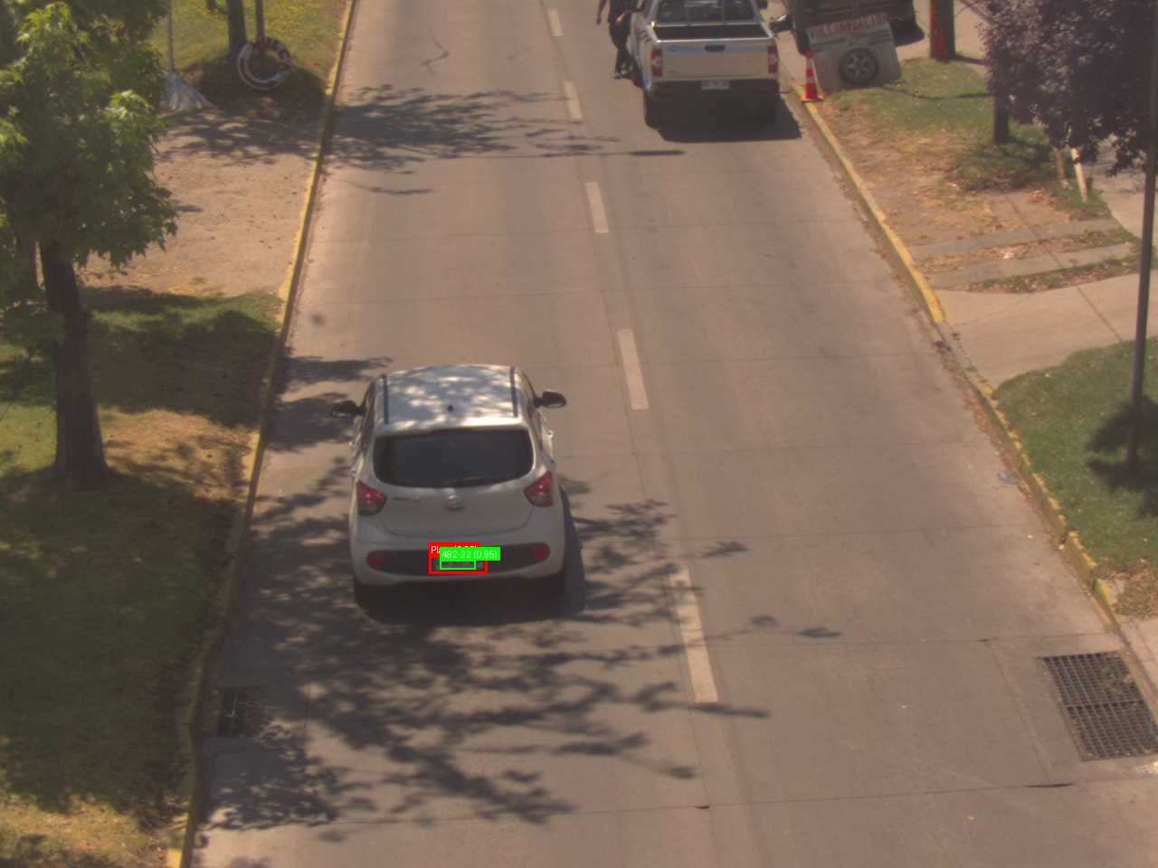 Processed image with license plate annotations